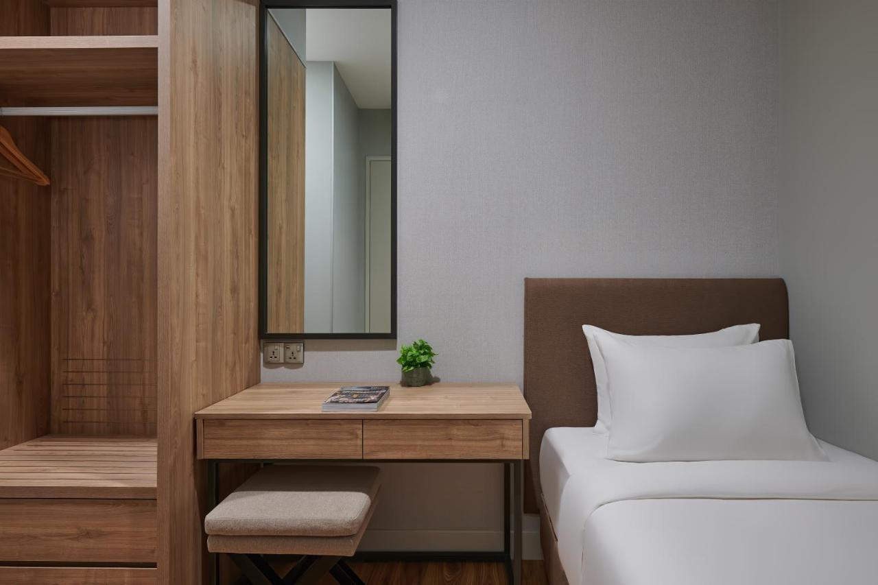 Mercure Living Putrajaya Exterior foto A bedroom at the hotel