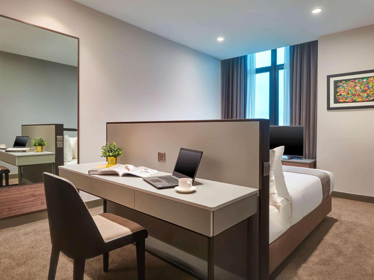 Mercure Living Putrajaya Exterior foto A bedroom at the hotel
